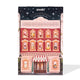 Zooki 28 Days of Radiance New Brave Longer Advent Calendar, designed as a vintage pink and red brick building with illustrated windows and a starry night sky header.