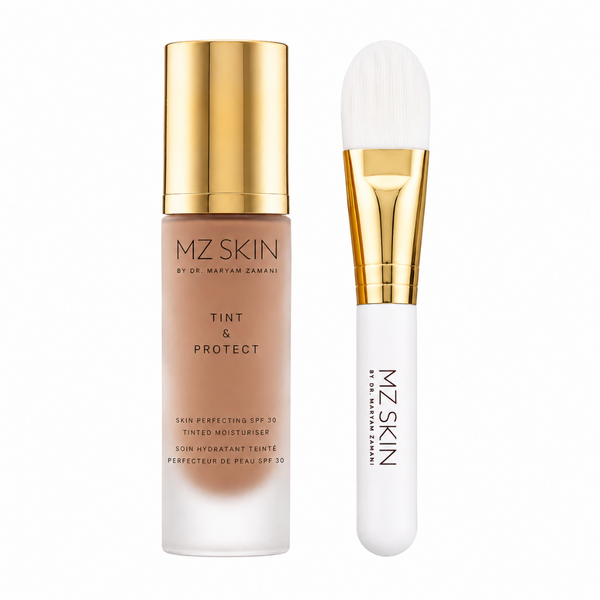 MZ Skin Tint & Protect SPF 30 tinted moisturizer bottle next to a matching white and gold applicator brush on a white background.
