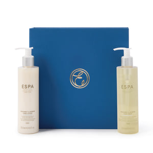 Two ESPA bottles with a blue box featuring the ESPA logo on a white background