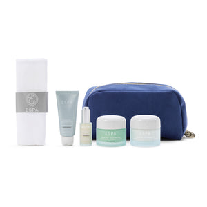 ESPA skincare products with a blue pouch on a white background