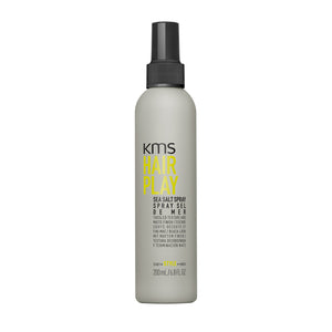 KMS Hair Play Sea Salt Spray bottle on a white background