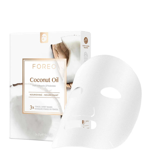 FOREO Coconut Oil facial sheet masks, showing the white product box with gold accents and a single white mask in front on a clean white background.