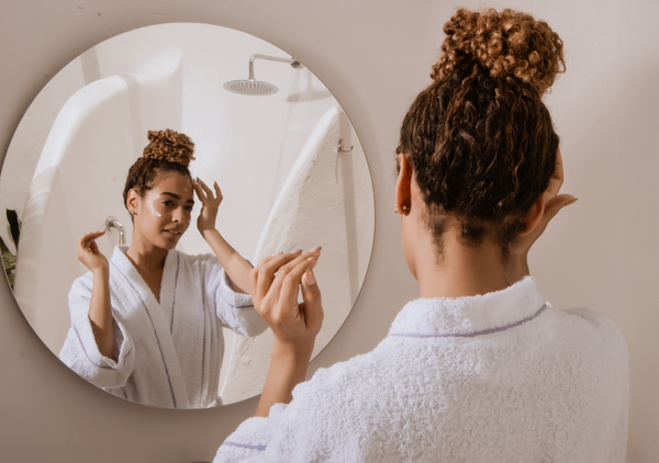 Woman applying skincare