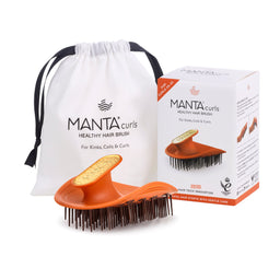 Manta Curls Healthy Hair Brush set including an orange silicone hair brush with black bristles, a white drawstring storage bag, and the product box on a white background.