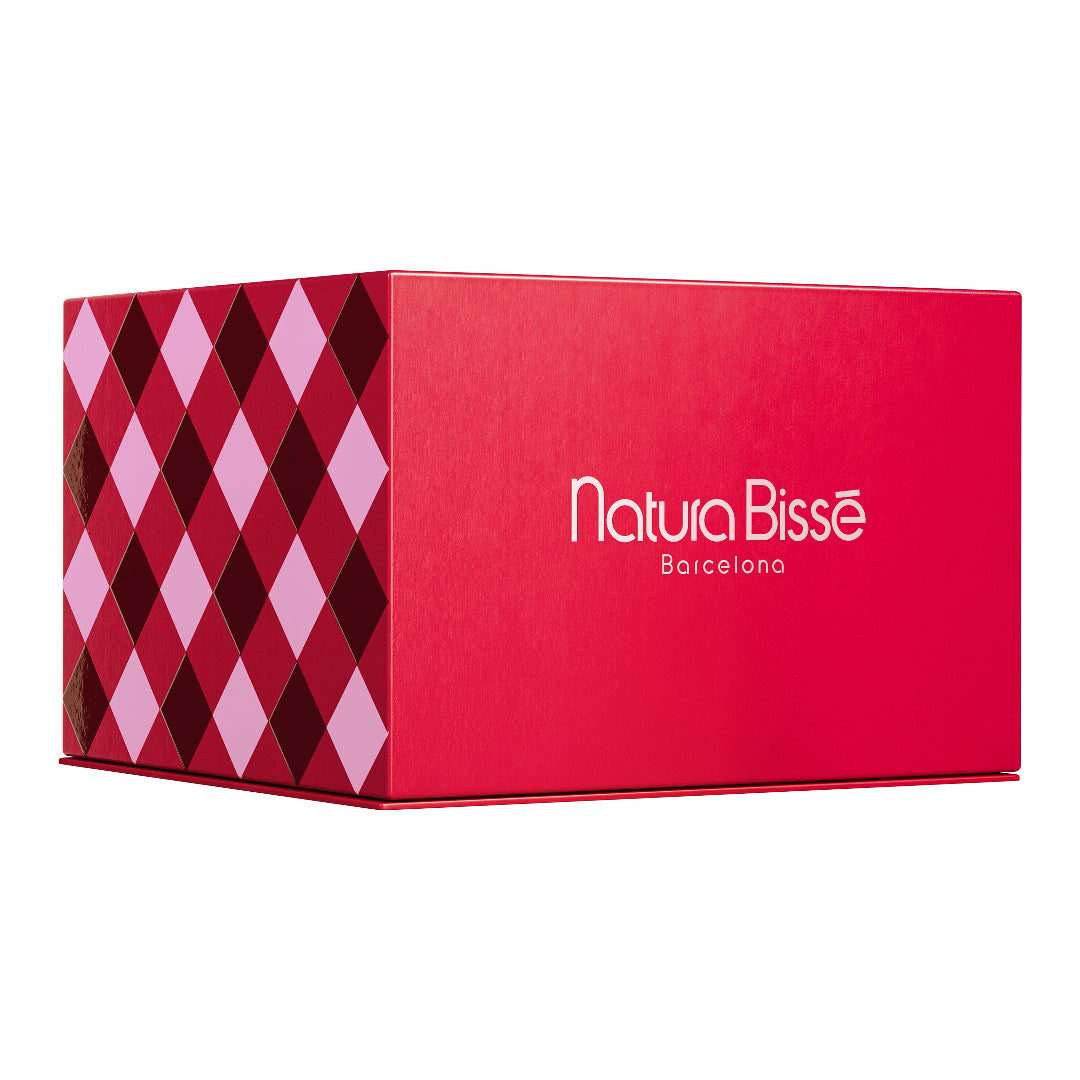 A red rectangular product box with a geometric diamond pattern on the left side and the white text 'Natura Bisse Barcelona' printed on the front, shown on a plain white background.