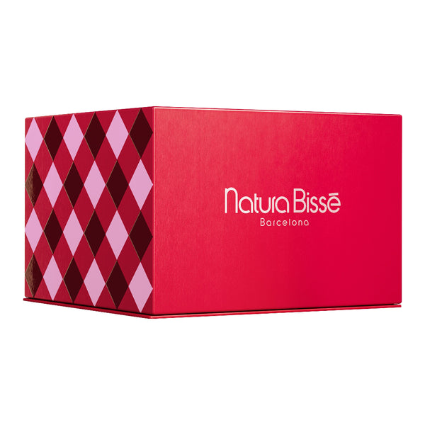 A red rectangular product box with a geometric diamond pattern on the left side and the white text 'Natura Bisse Barcelona' printed on the front, shown on a plain white background.