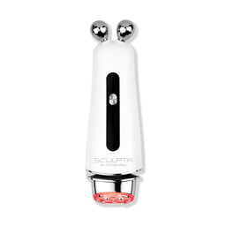 White handheld device with silver knobs and red light on a white background