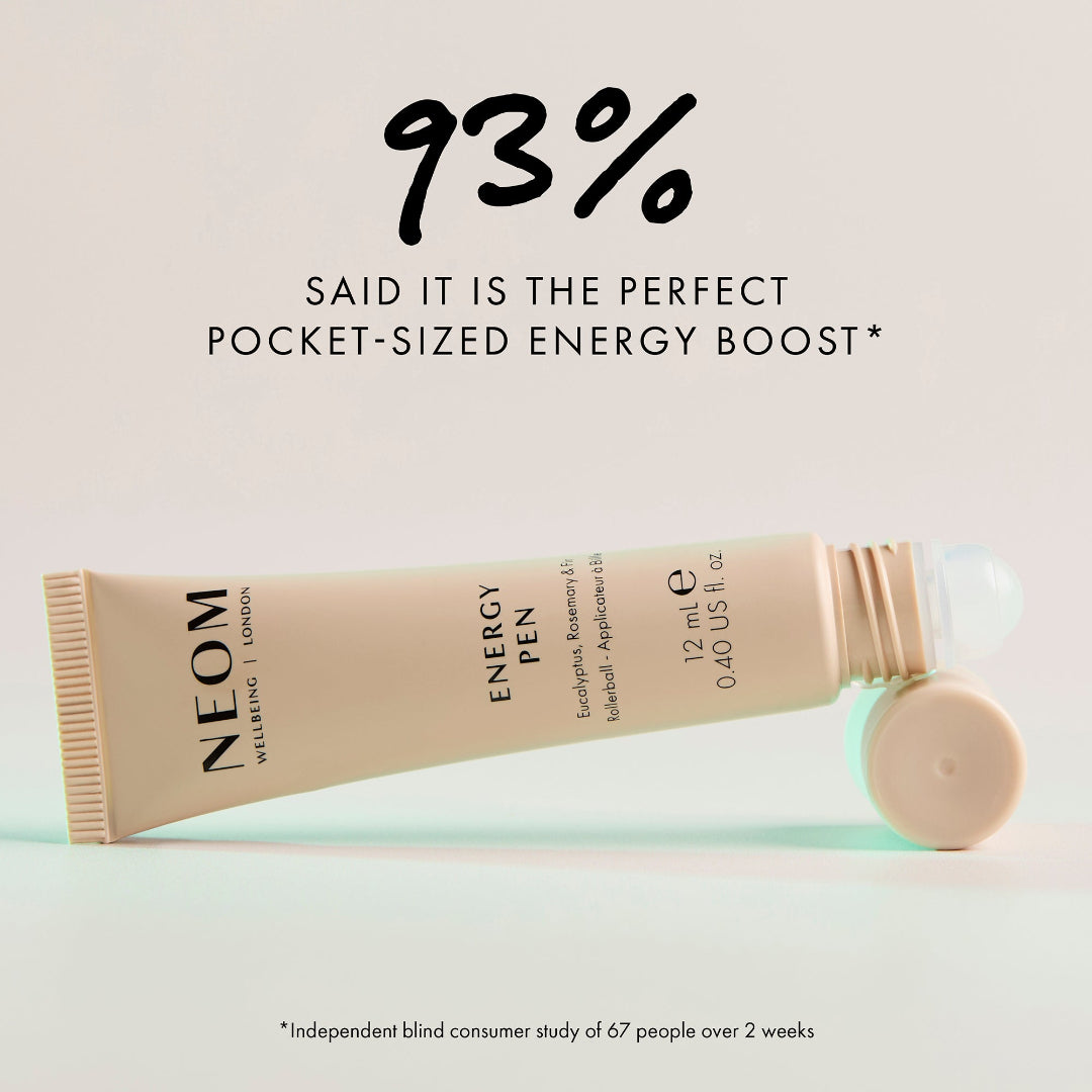 NEOM Energy Pen with text about being a pocket-sized energy boost on a light background