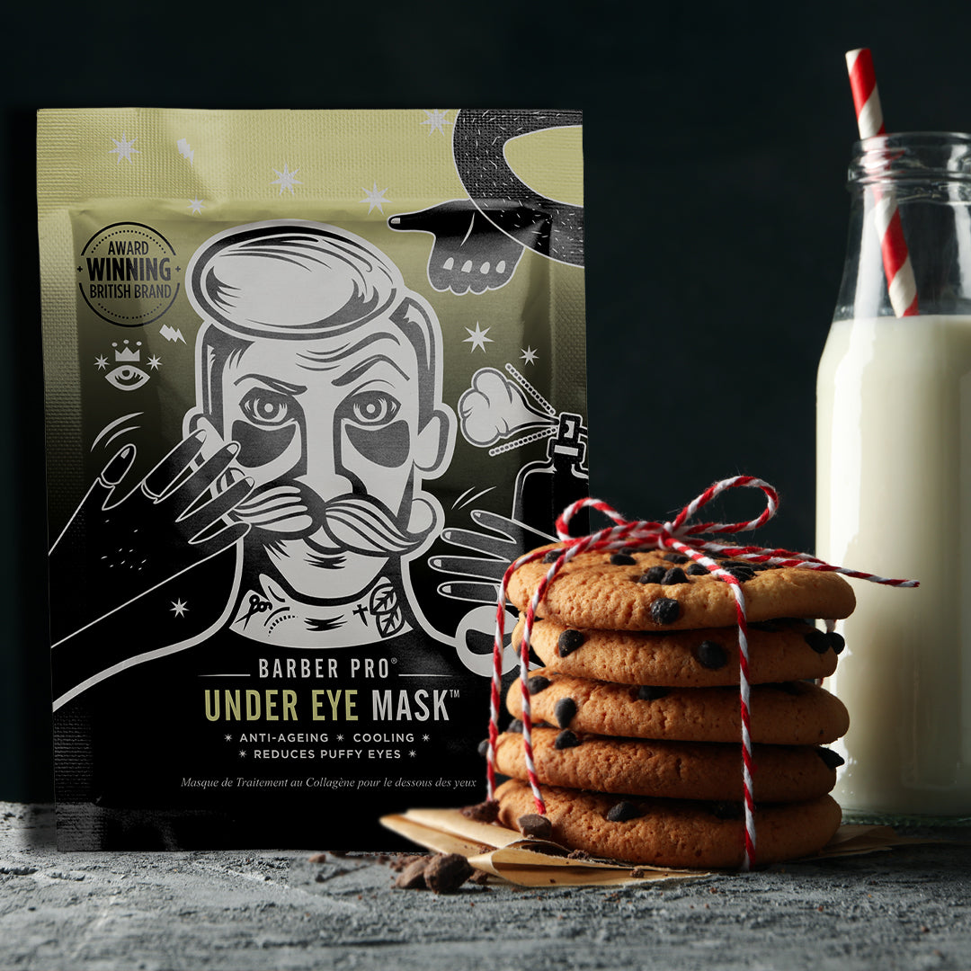 Barber Pro under eye mask packaging with a stack of cookies and a glass of milk.