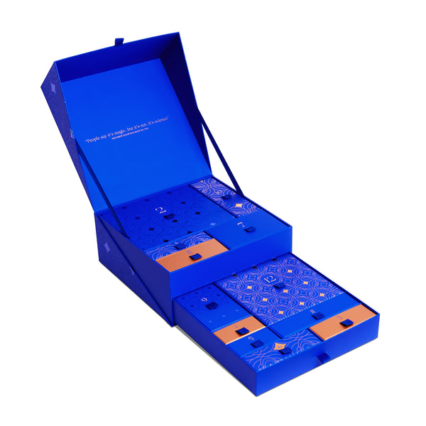 Blue gift box with intricate design on a white background