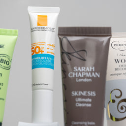 Collection of skincare products including La Roche-Posay and Sarah Chapman on a gray background