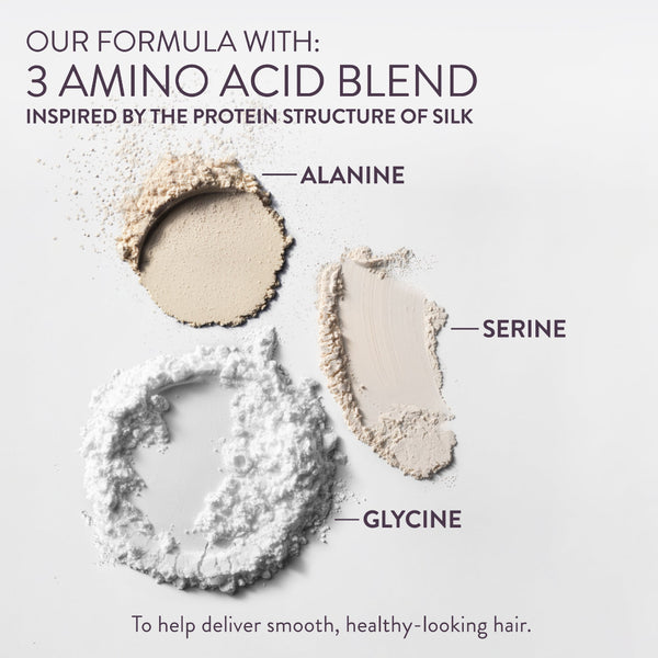 Three labeled powder swatches on a light gray background: Alanine in a warm beige tone, Serine in a pale cream-beige tone, and Glycine in a bright white tone. Text at the top reads 'OUR FORMULA WITH: 3 AMINO ACID BLEND' and 'INSPIRED BY THE PROTEIN STRUCTURE OF SILK,' with additional text at the bottom about helping deliver smooth, healthy-looking hair.