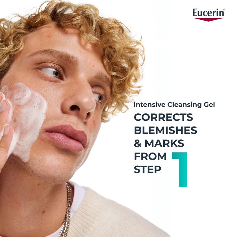 Person applying Eucerin Intensive Cleansing Gel to face with text about blemish correction.