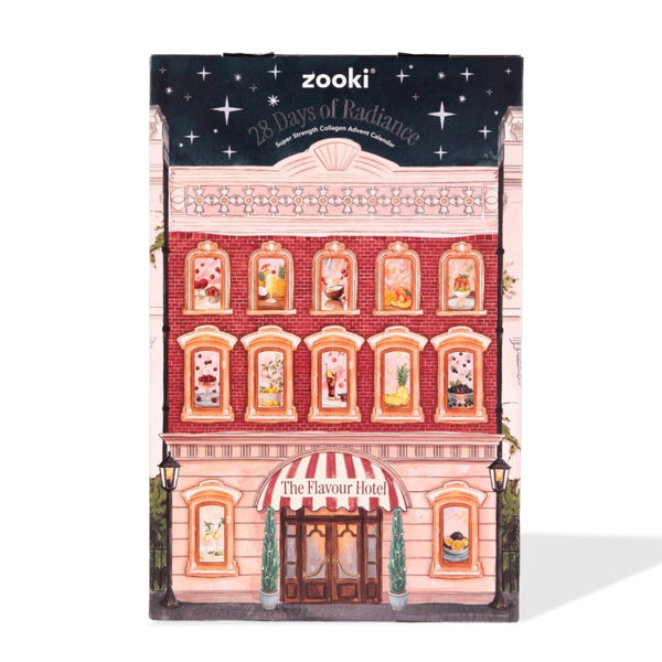 Zooki 28 Days of Radiance New Brave Longer Advent Calendar, designed as a vintage pink and red brick building with illustrated windows and a starry night sky header.