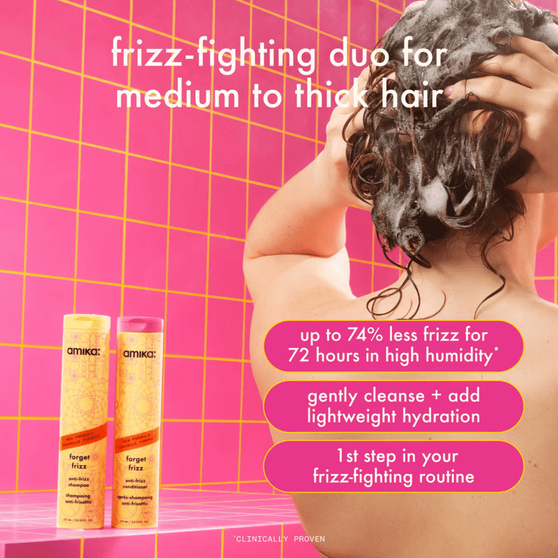Advertisement for a hair care product with a person washing hair against a pink grid background