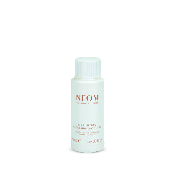 Neom bottle of Real Luxury Magnesium Bath Milk on a white background