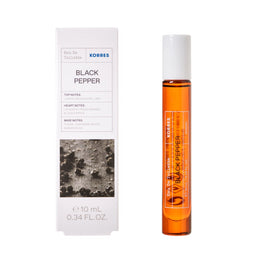 Korres Black Pepper perfume bottle and packaging on a white background
