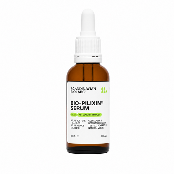 A 30 mL amber glass dropper bottle of Scandinavian Biologs Bio-Pilixin Serum on a plain white background.