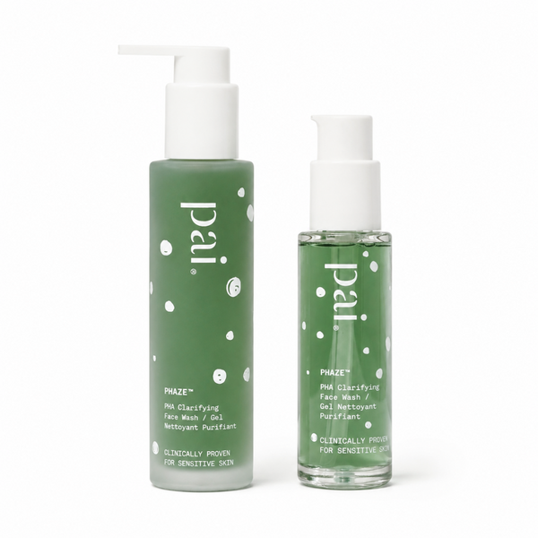 Two green skincare bottles with white pumps on a white background. The larger bottle is labeled PAI PAZE+ PM Clarifying Face Wash, and the smaller bottle is labeled PAI PAZE+ PM Clarifying Face Wash Gel Nettoyant Purifiant.