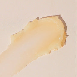 Close-up of a beige color swatch on a light beige background