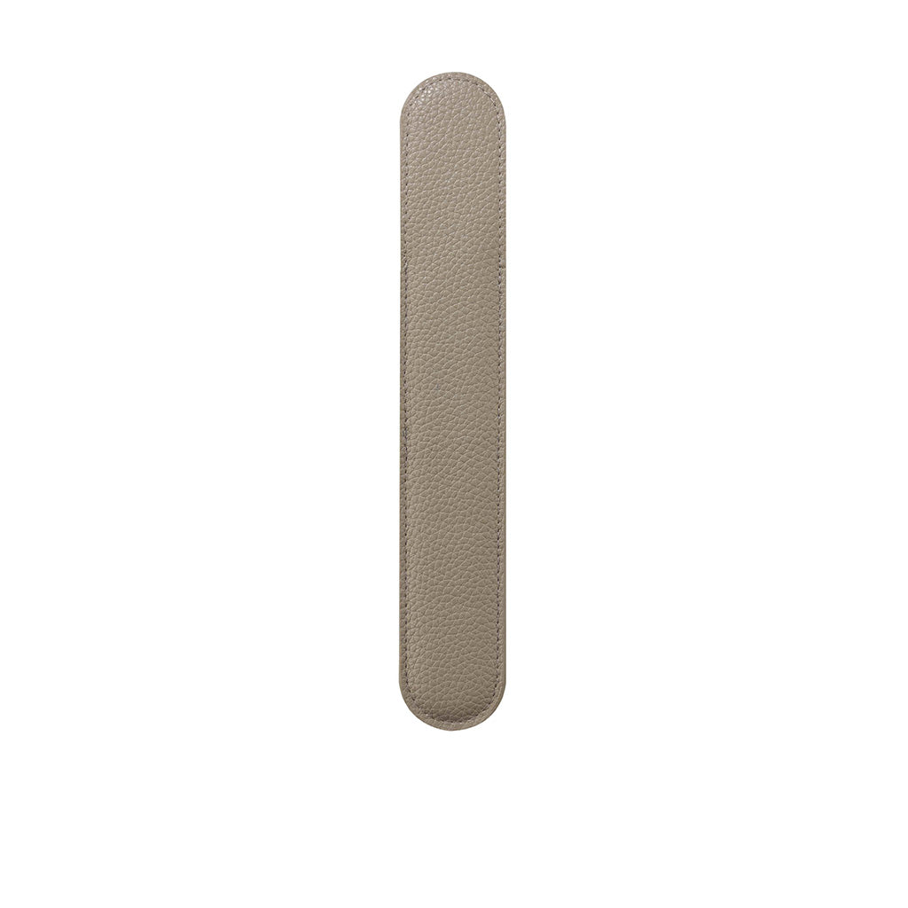 Beige nail file on a white background