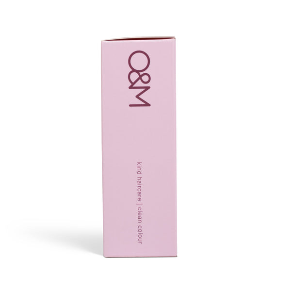 Pink box with 'O&M' branding on a white background