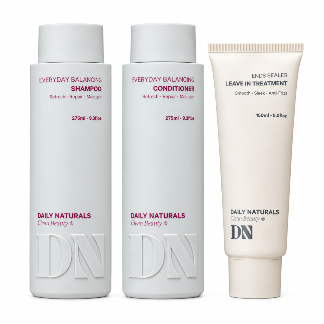 Three Daily Naturals Clear Beauty hair care products on a white background: Everyday Balancing Shampoo, Everyday Balancing Conditioner, and Ends Sealer Leave In Treatment.
