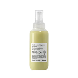 Hair serum bottle with label on a white background