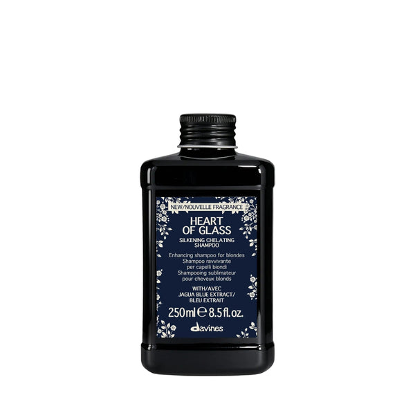 Black shampoo bottle labeled 'Heart of Glass' on a white background