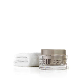 Jar of Emma Hardie Moringa Cleansing Balm with dual cleansing cloth on a white background