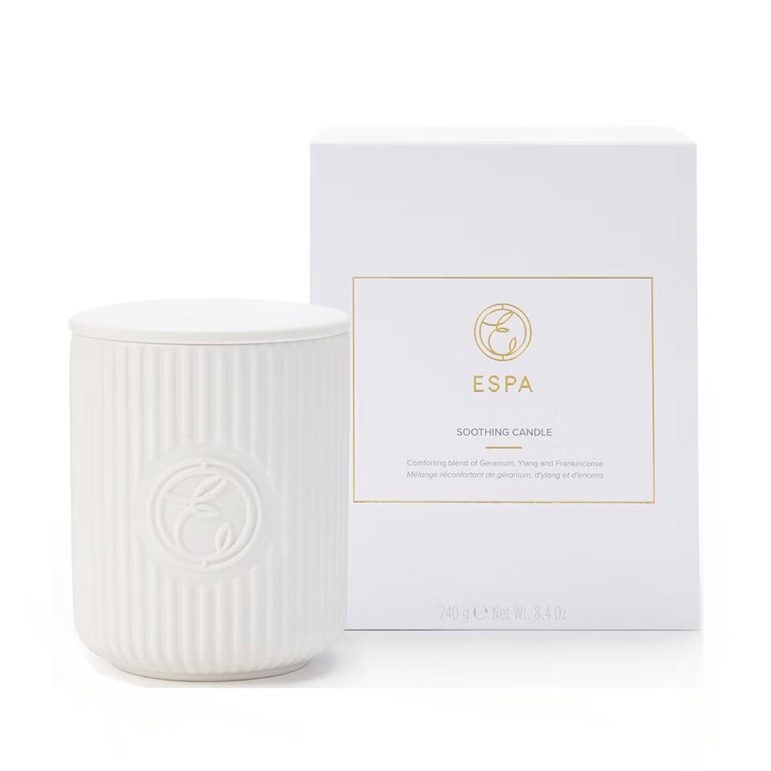 White candle with ribbed texture and matching white box featuring 'ESPA' branding on a white background.