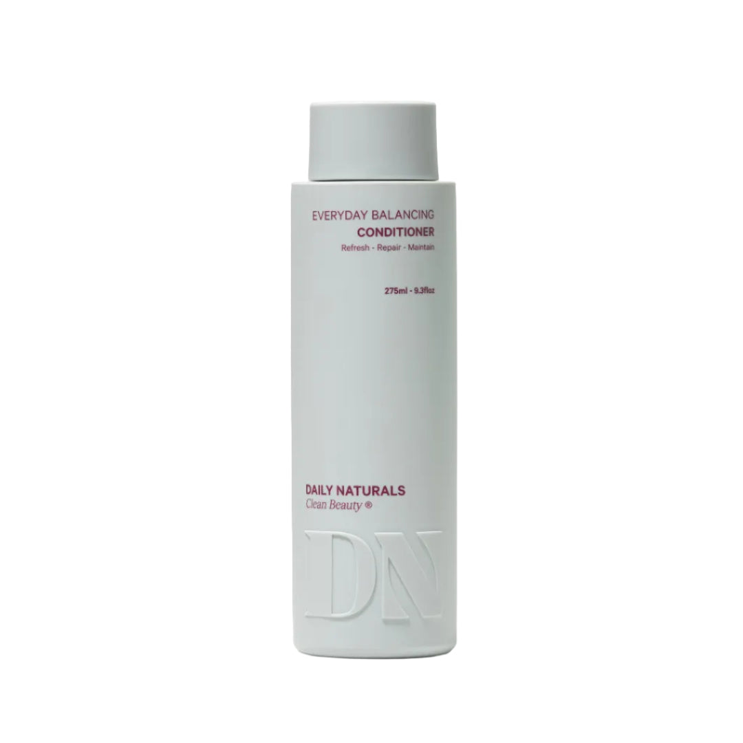 Conditioner bottle labeled 'Everyday Balancing Conditioner' by 'Daily Naturals' on a light gray background