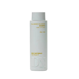 Shampoo bottle labeled 'Daily Naturals' on a white background