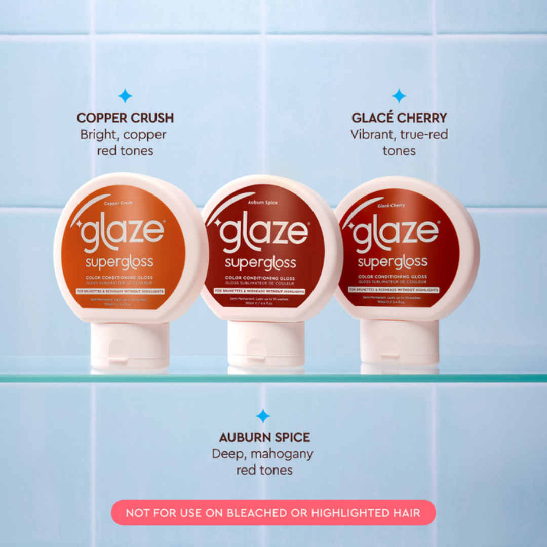 Three bottles of 'glaze supergloss' with color options and descriptions on a blue tiled background.