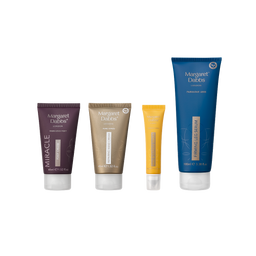 Four Margaret DaBbos cosmetic tubes arranged in a row on a plain white background: a dark purple Miracle Hair Growth tube, a metallic gold Miracle Shine + Volume tube, a small yellow tube, and a tall blue Fabulous BS Serum tube.
