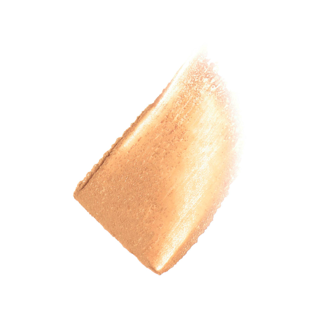 Close-up of a beige makeup swatch on a white background