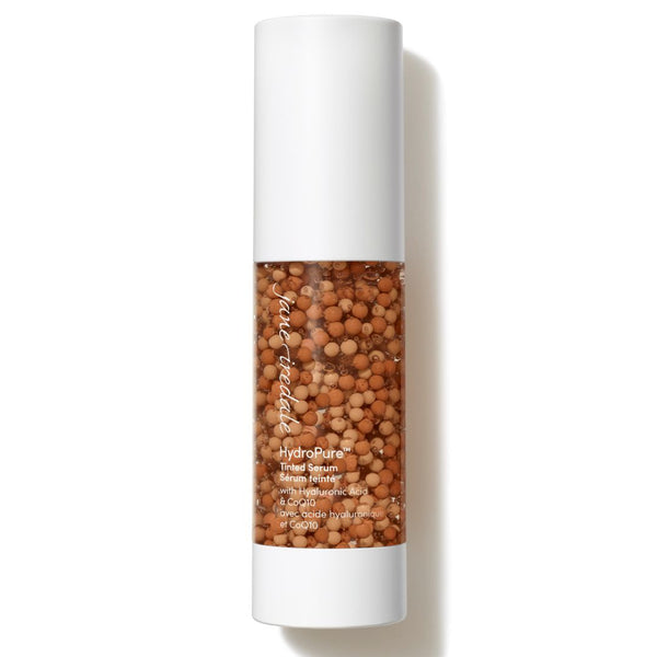 Skincare bottle with brown颗粒物 on a white background