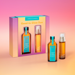 Moroccanoil Good-to-Glow Duo set on a gradient background