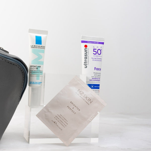 Three skincare products on a white background