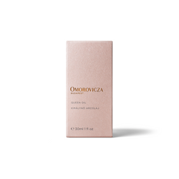 A rectangular pink box for Omorovicza Queen Oil, photographed upright against a clean white background with a soft shadow.