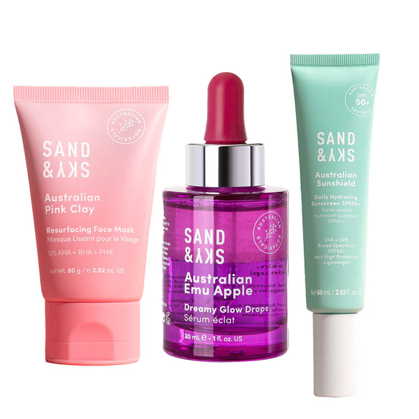 Three Sand & Sky skincare products on a white background