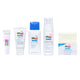 Set of Sebamed skincare products including gel, toner, foam, and bar on a white background