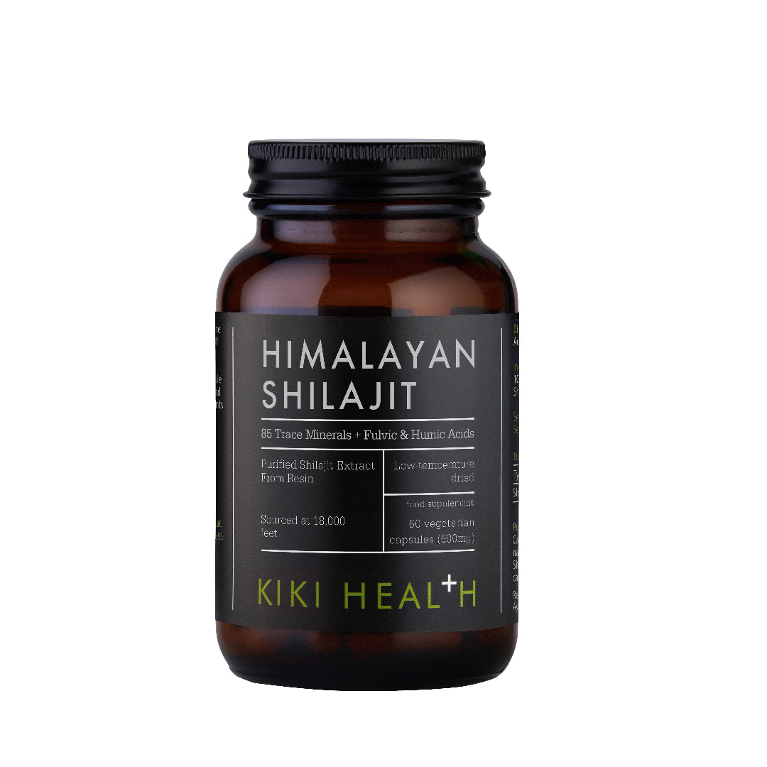 A dark amber glass bottle of Kiki Health Himalayan Shilajit with a black cap and a black label featuring white and lime green text, set against a plain white background.