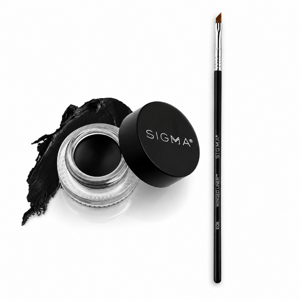 Sigma black gel eyeliner shown in an open clear jar with the black lid beside it, next to a swipe of the black pigment and a fine detail brush on a white background.