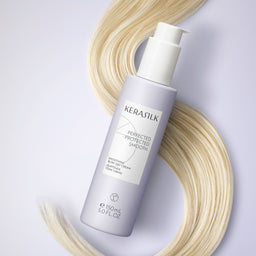 Kerastik hair care product with blonde hair strands on a light background