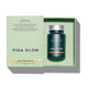Vida Glow supplement bottle in a green box on a white background