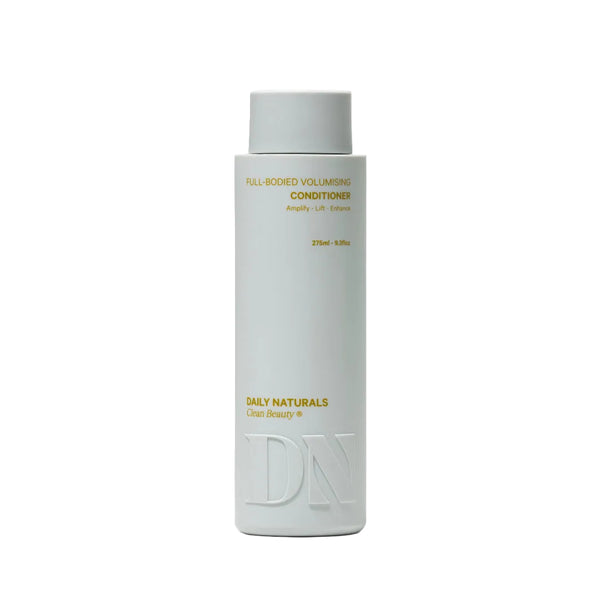 White bottle of Daily Naturals conditioner on a light gray background