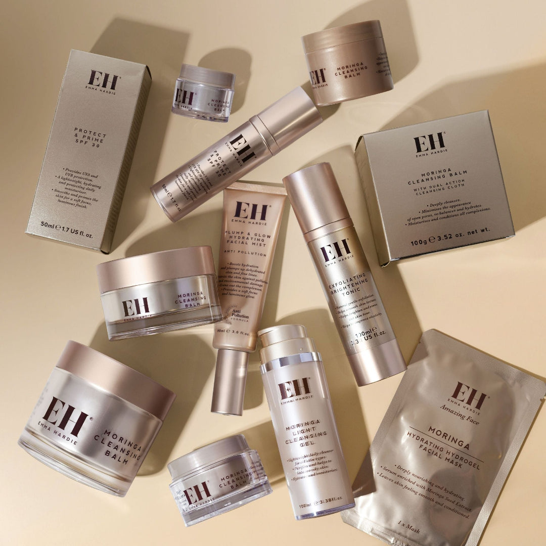 Full range of Emma Hardie Amazing face products on a beige background