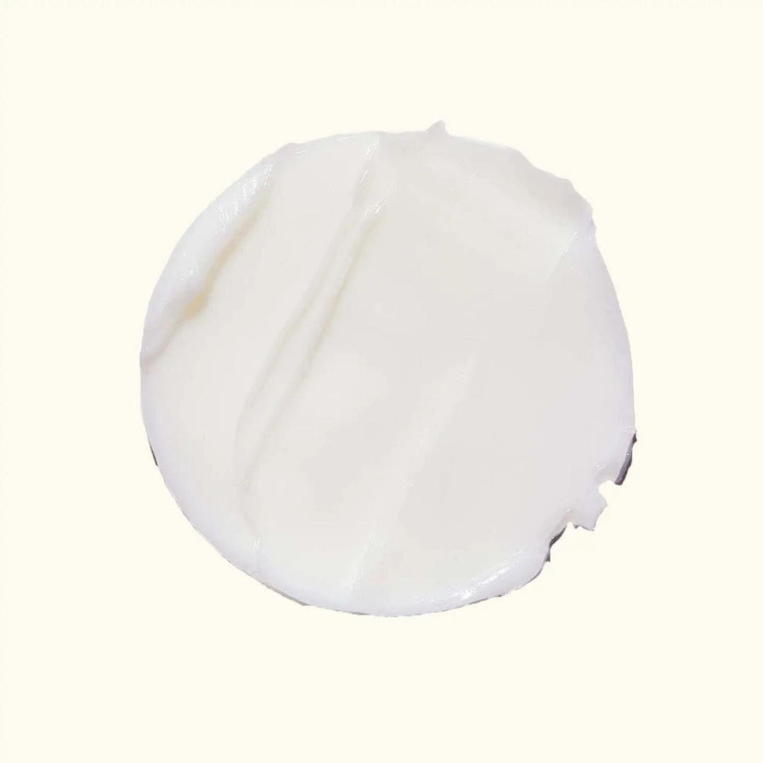 White plastic cap on a white background