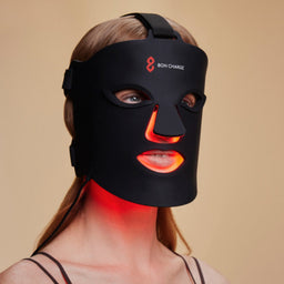 Woman Wearing Red Light Face Mask